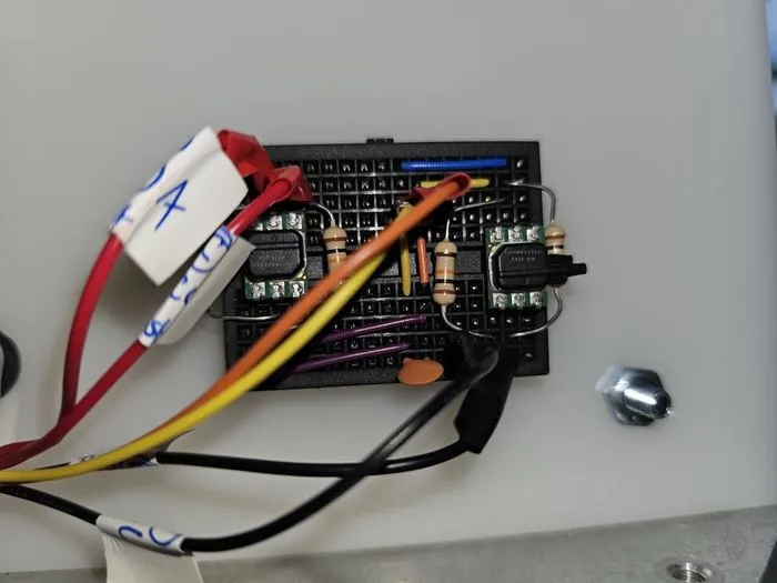 The Raspberry Pi 5 mounted on the HDPE control plate with power and signal wiring attached.