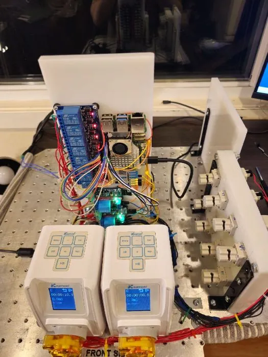 An earlier build stage with both pumps and the control electronics positioned on the baseplate.